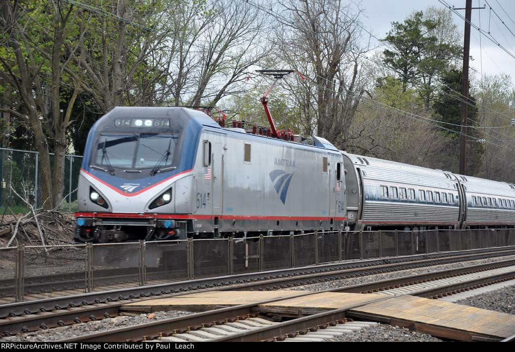 Regional cruises west through the station